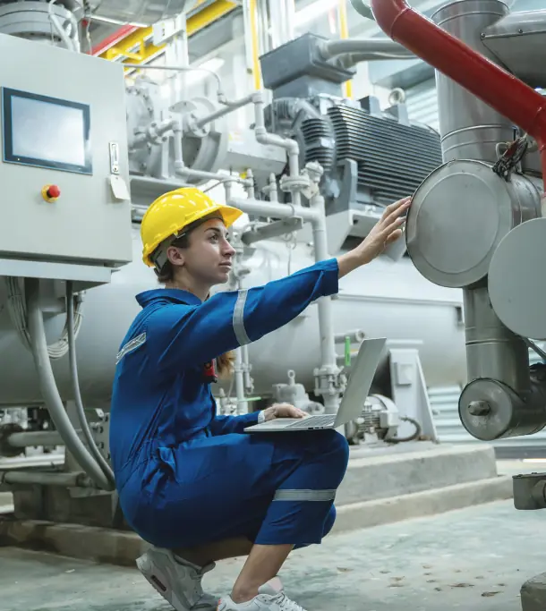 Engineer inspecting industrial equipment